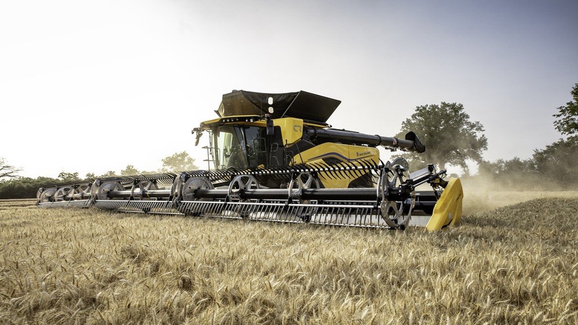 New Holland combine harvesting grain