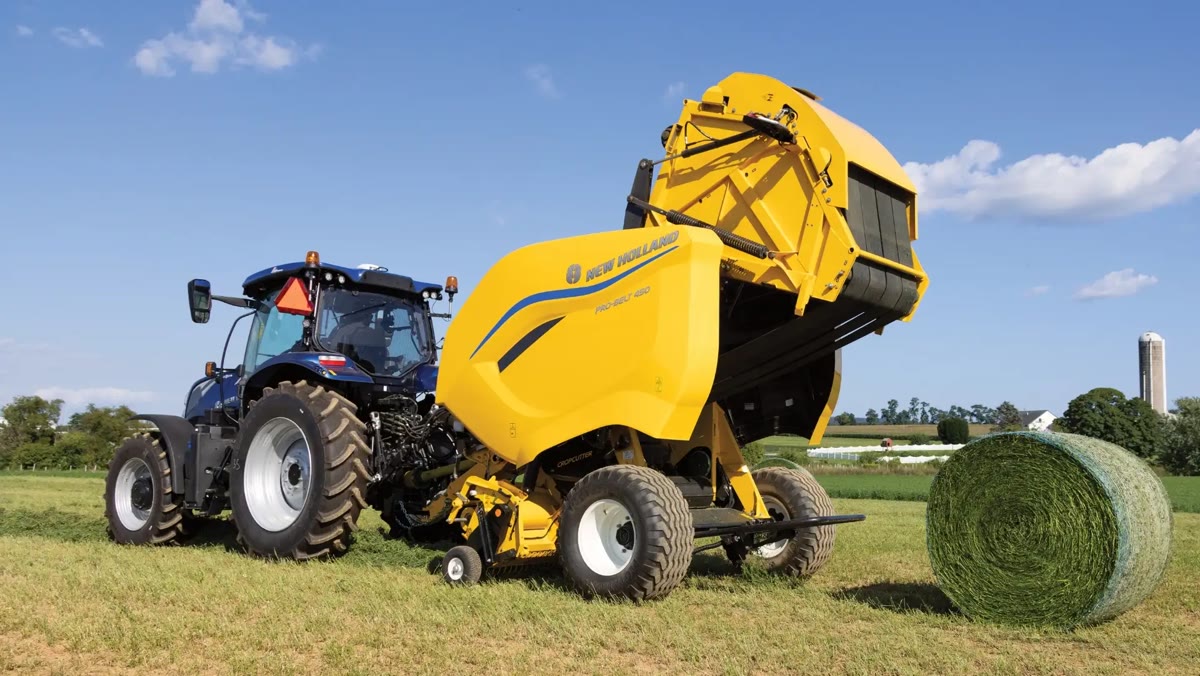 New Holland Roll-Belt round baler dropping a wrapped bale